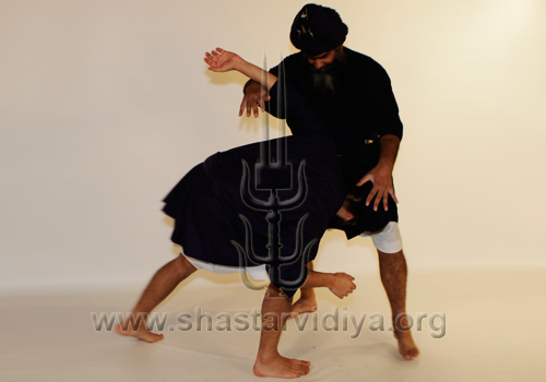 Nihang Nidar Singh executing a technique in the Narsingha Yudhan combat style