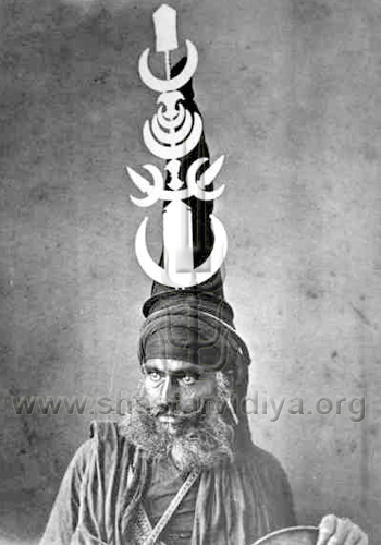 Akali Nihang Singh adorned with a Gajgah, symbolic of Shiv Shakti, late 19th century, Hyderabad